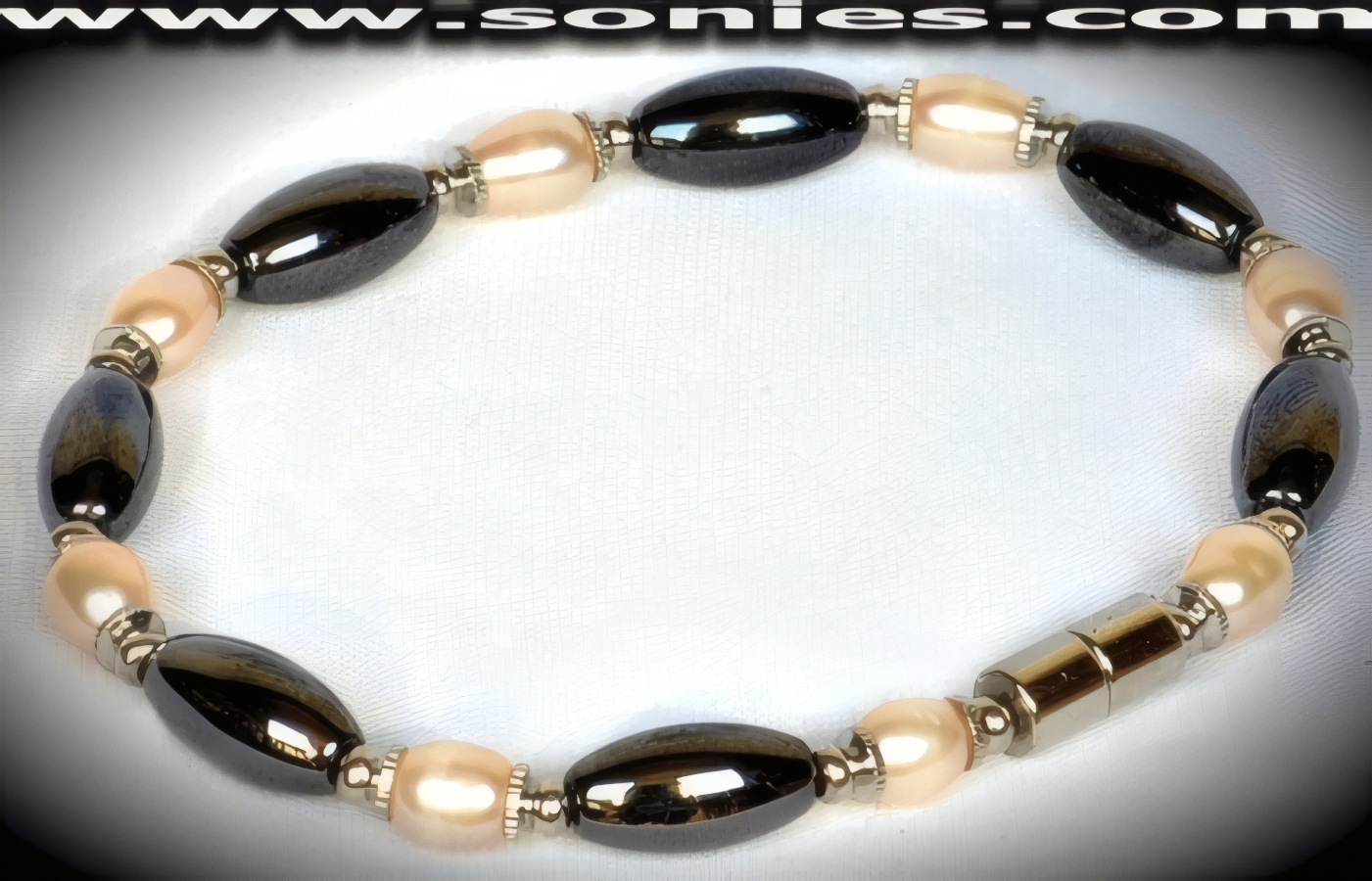 Cyclops magnetic Hematite with pearl glass beaded bracelet