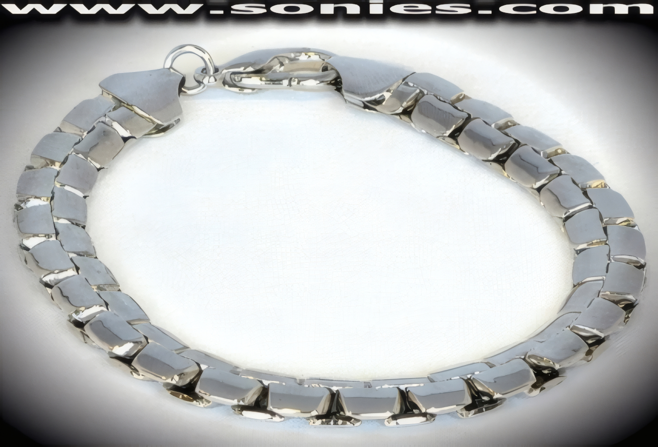 Intricate anodized silver interlock bracelet
